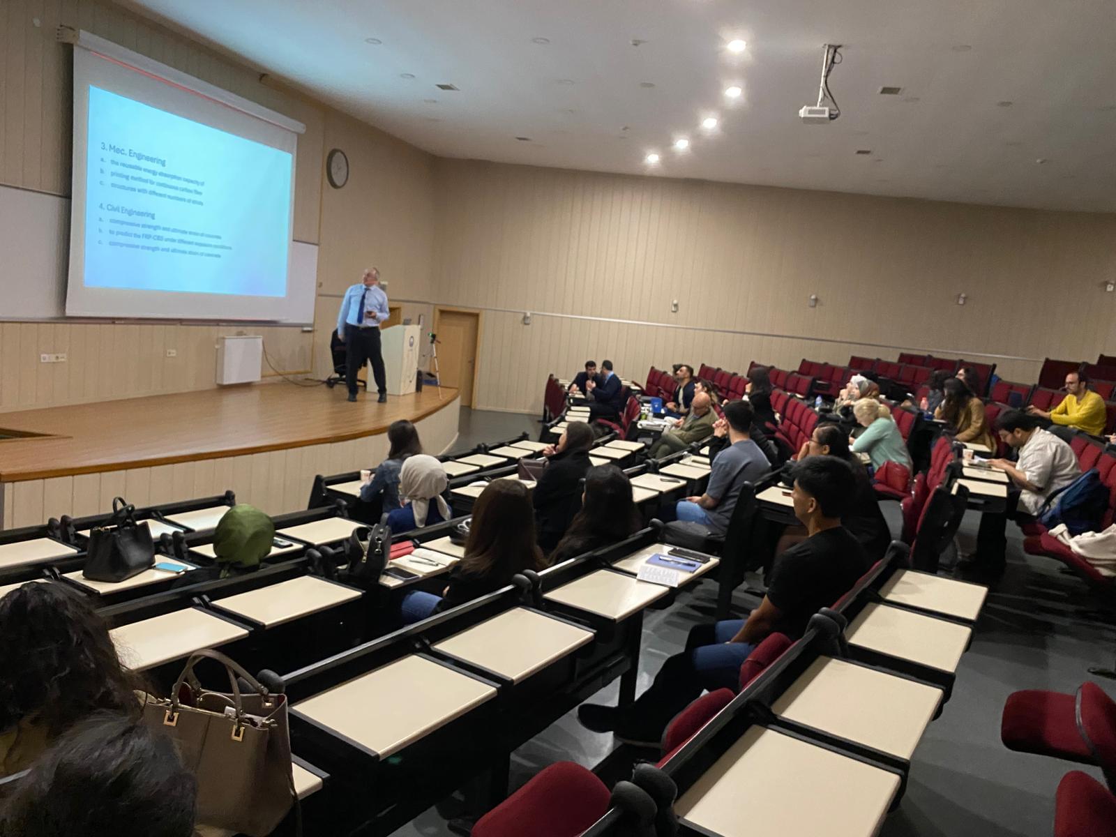 Trainees attending a presentation at an amphitheatre